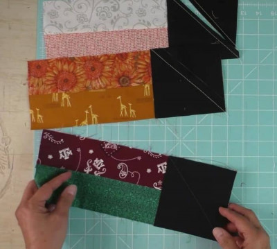 How to Make a Jelly Roll Sizzle Quilt (with Free Pattern) - DIY Joy