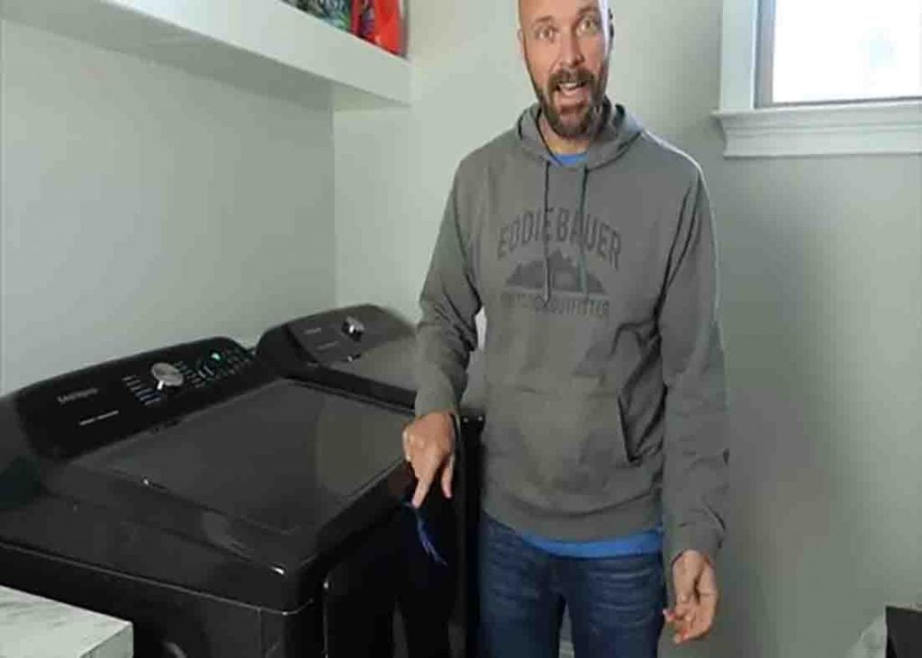 Drying the pair of shoes in the dryer