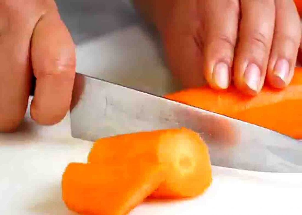 Chopping the carrots for the glazed carrots recipe