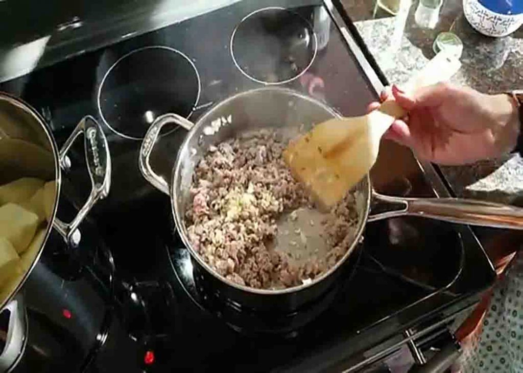 Cooking the Italian sausage for the casserole recipe