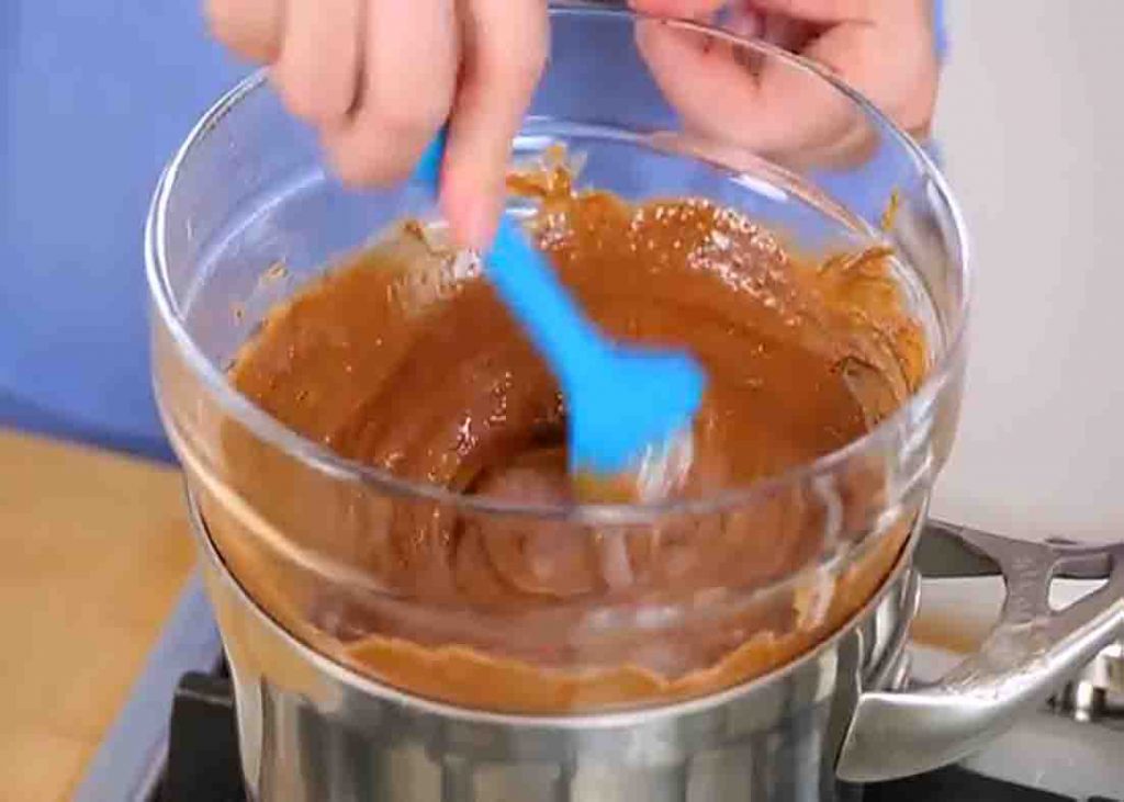 Mixing the chocolate and peanut butter for the oat bars recipe