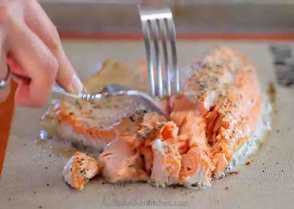 Flaking the salmon for the salmon cake recipe
