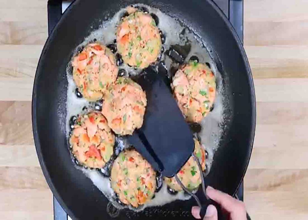 Frying the salmon cakes