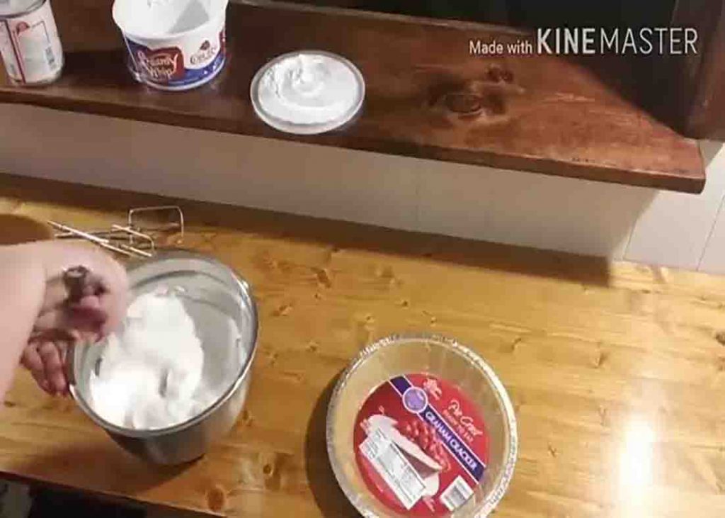 Mixing all the Kool Aid pie ingredients