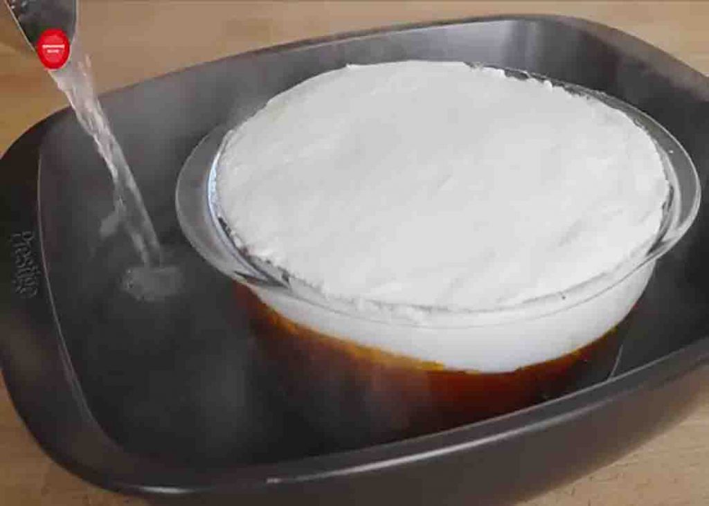 Preparing the meringue cake for baking