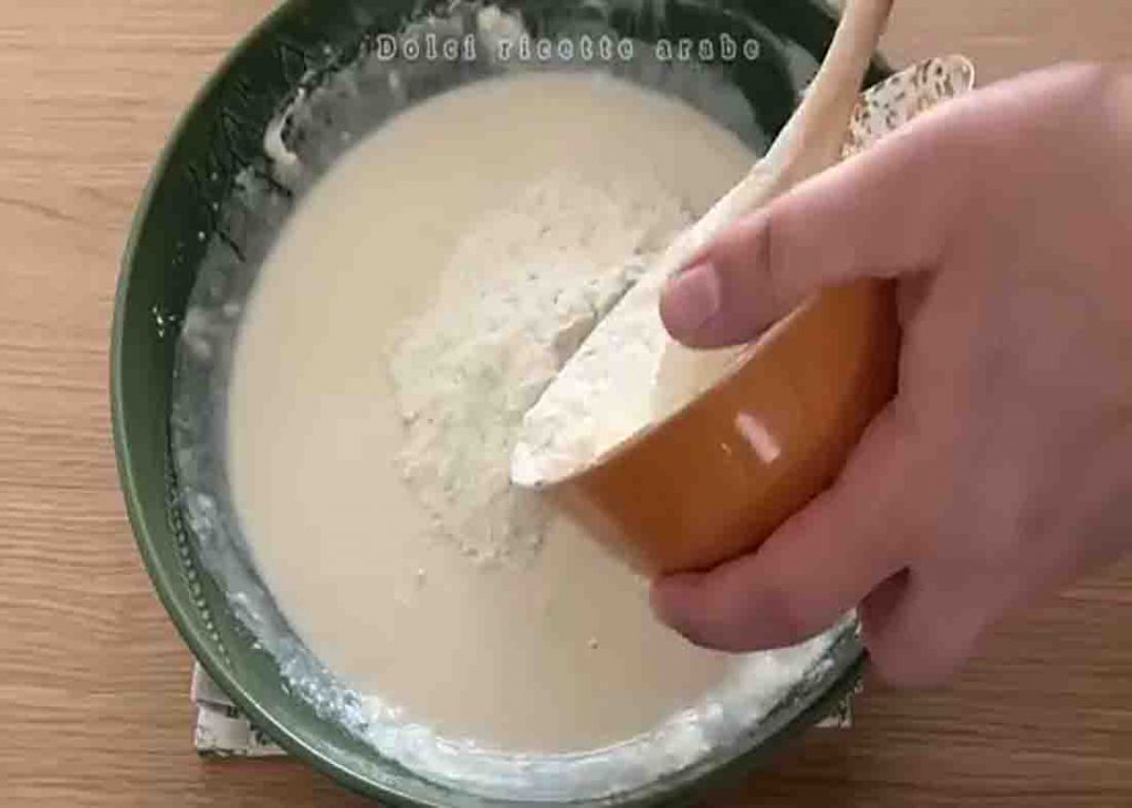 Mixing the flour for the stovetop flaky bread recipe 