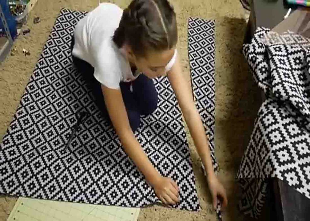 Cutting the fabric to make the DIY indoor hanging chair