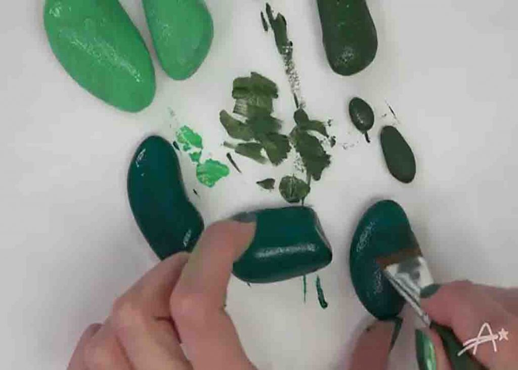 Painting the rocks with base color