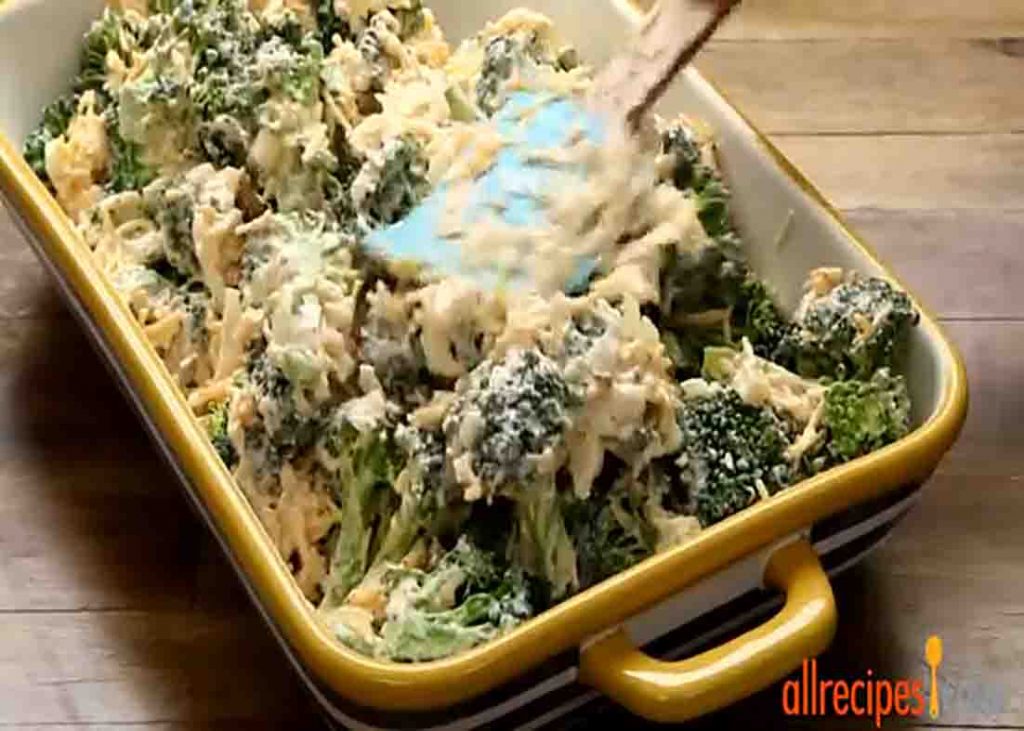 Transferring the broccoli mixture into the casserole