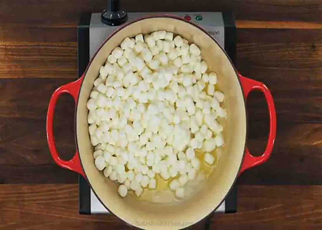 Melting the marshmallows for the rice krispie treats