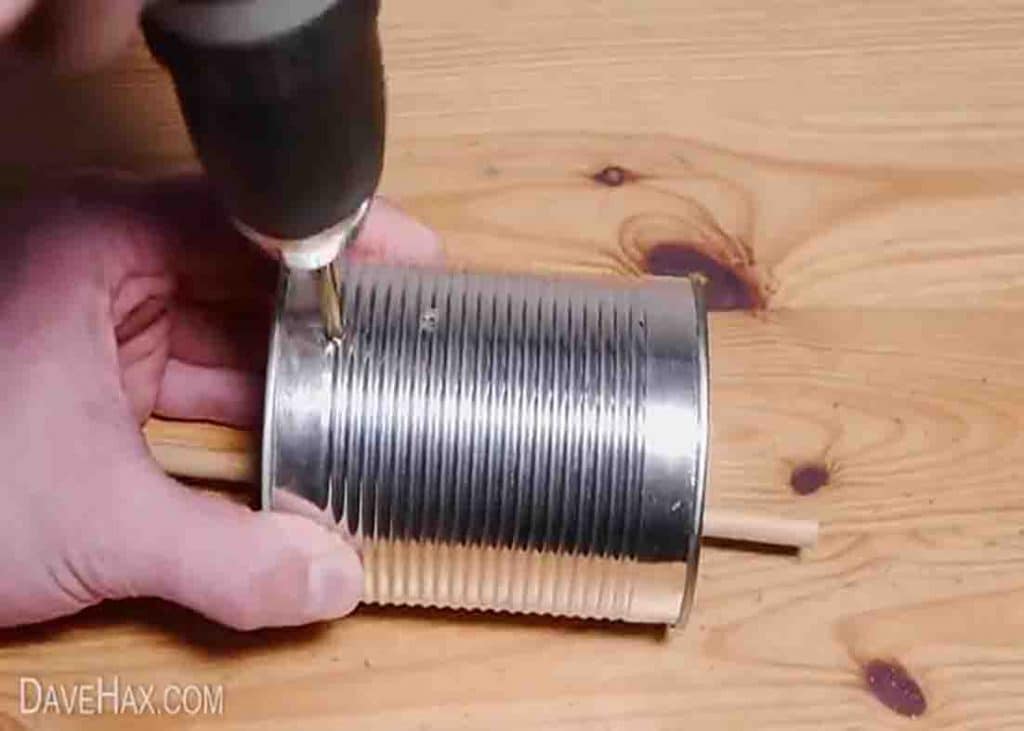 Attaching the cords for the tin can bird feeder hang