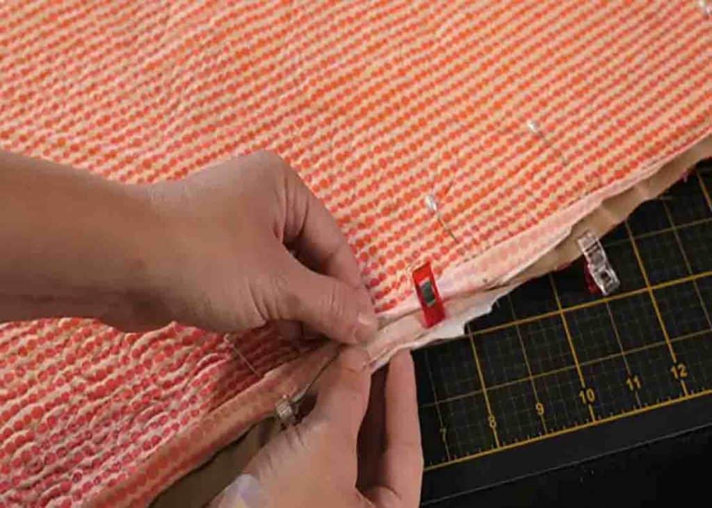 Hand stitching the back seam closed