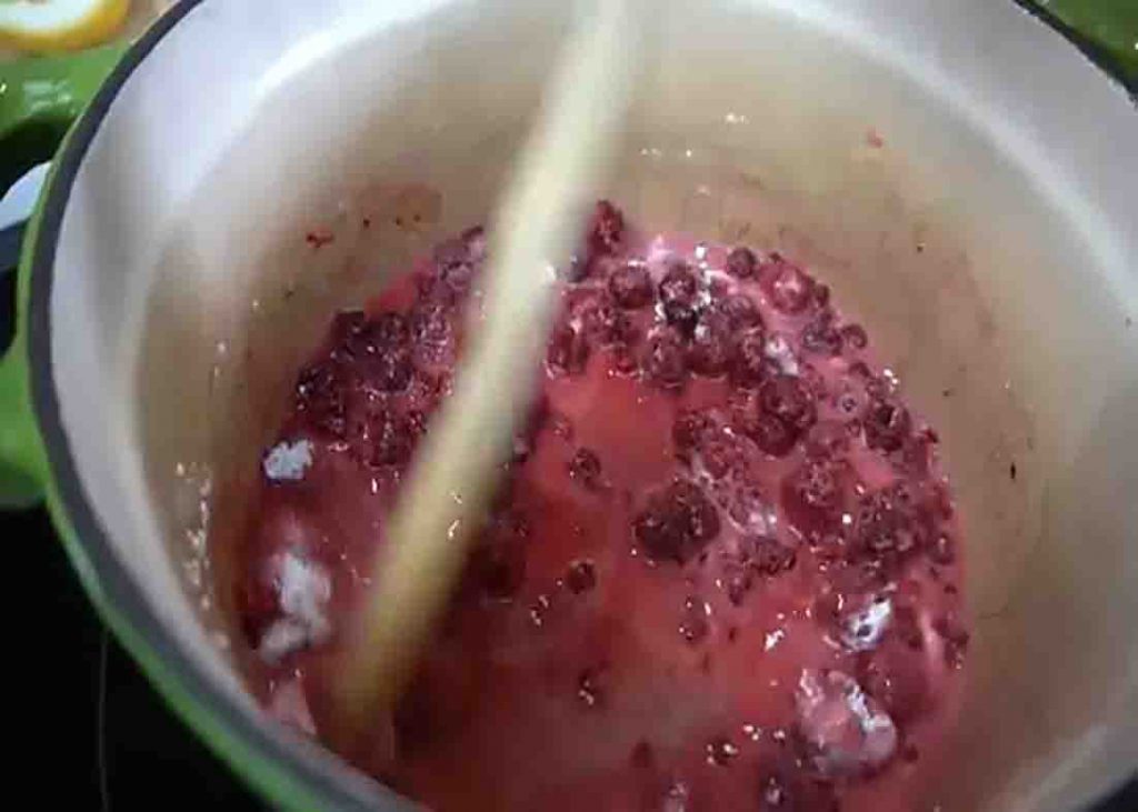 Making the raspberry sauce for the cream cheese danish