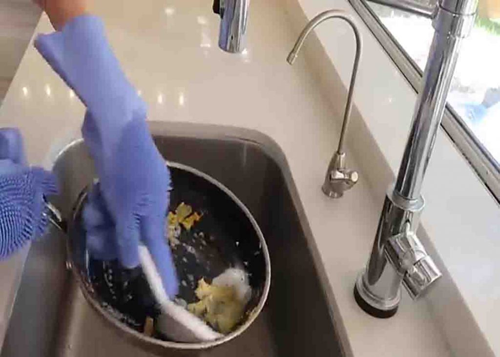 Brushing the pots gently with silicone brush