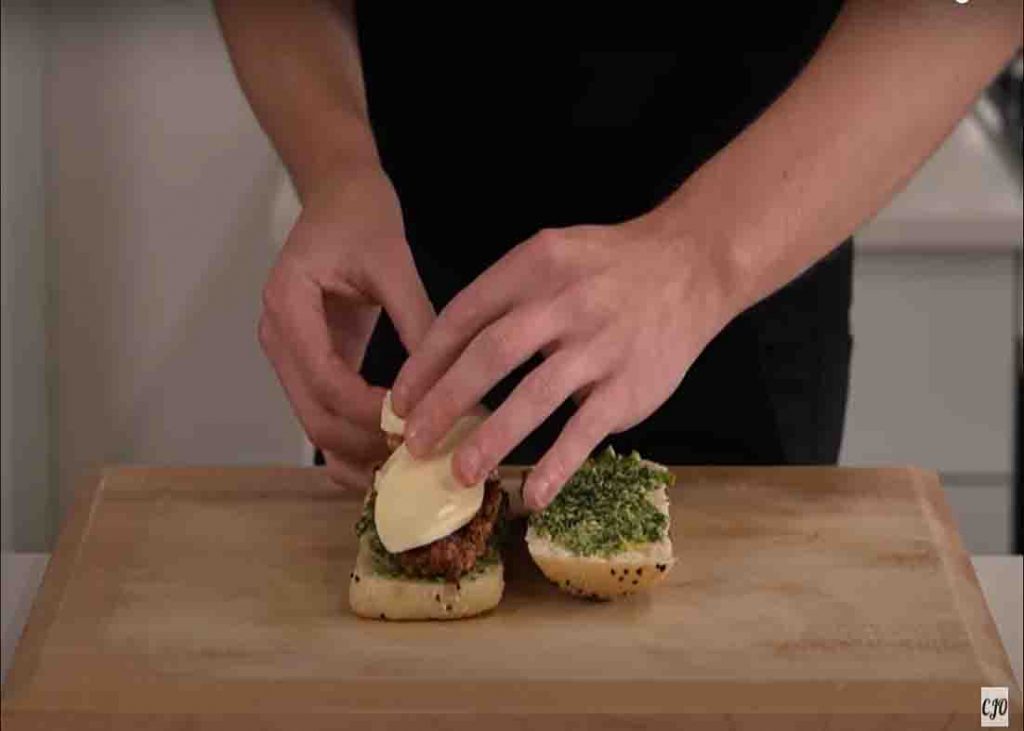 Assembling the chicken pesto sandwich