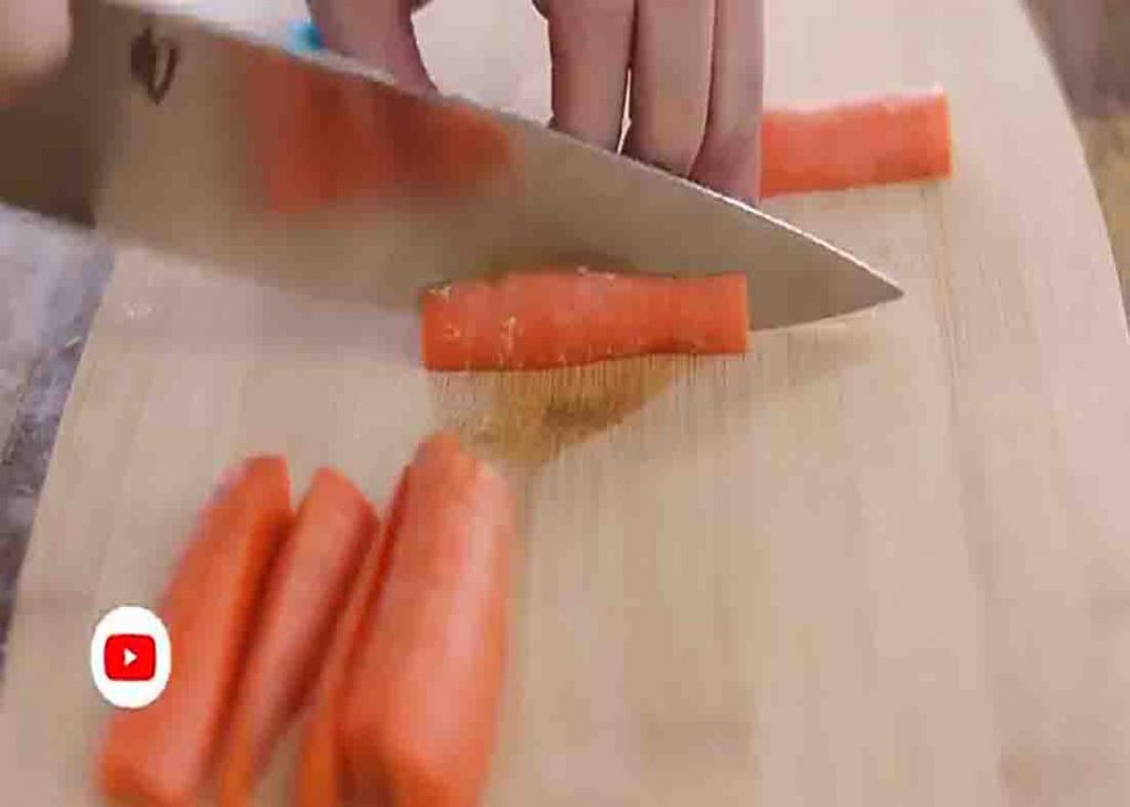 Slicing the carrots for the carrot fries recipe
