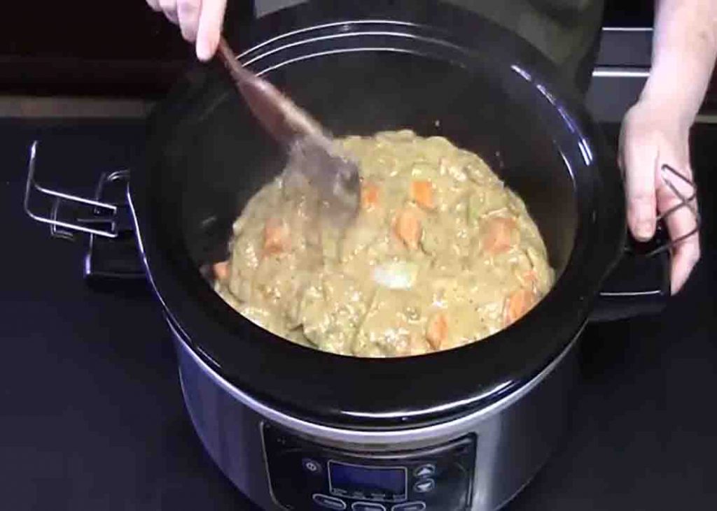 Pouring the sauce over the chuck roast