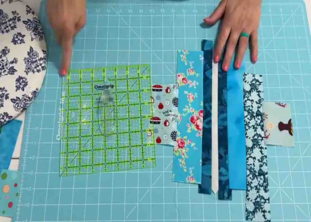Stitching the strips on the fabric square