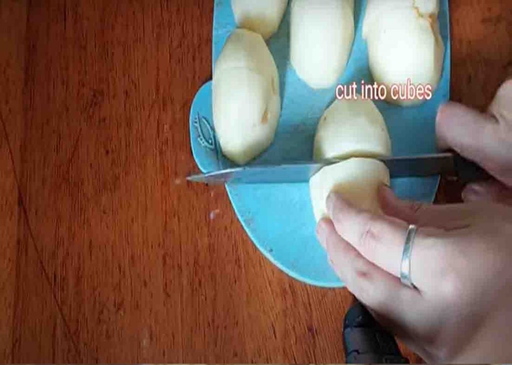 Cutting the potatoes into halves