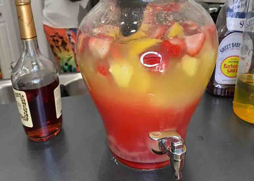 Mixing the hot girl summer hunch punch to combine