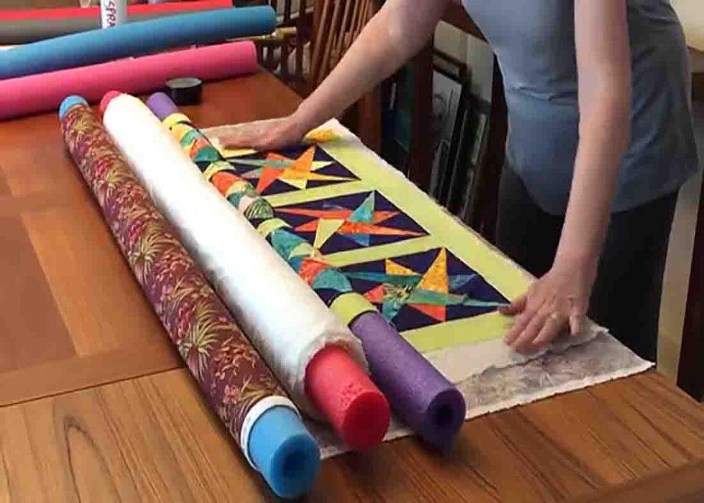 Pinning the quilt sandwich together