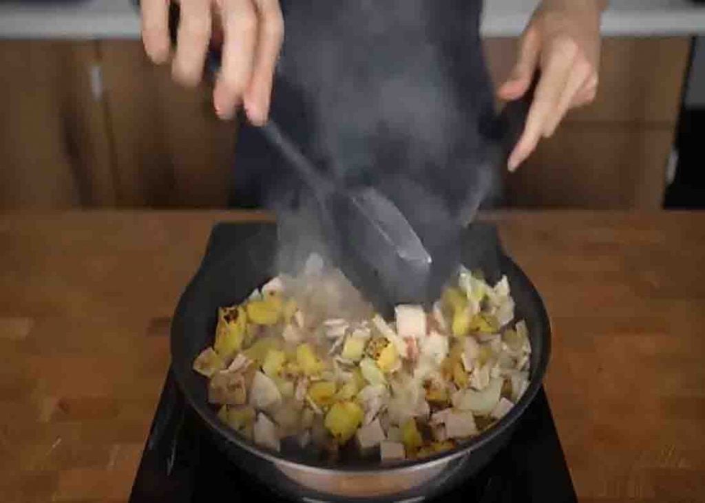 Cooking the breakfast hash in one pan