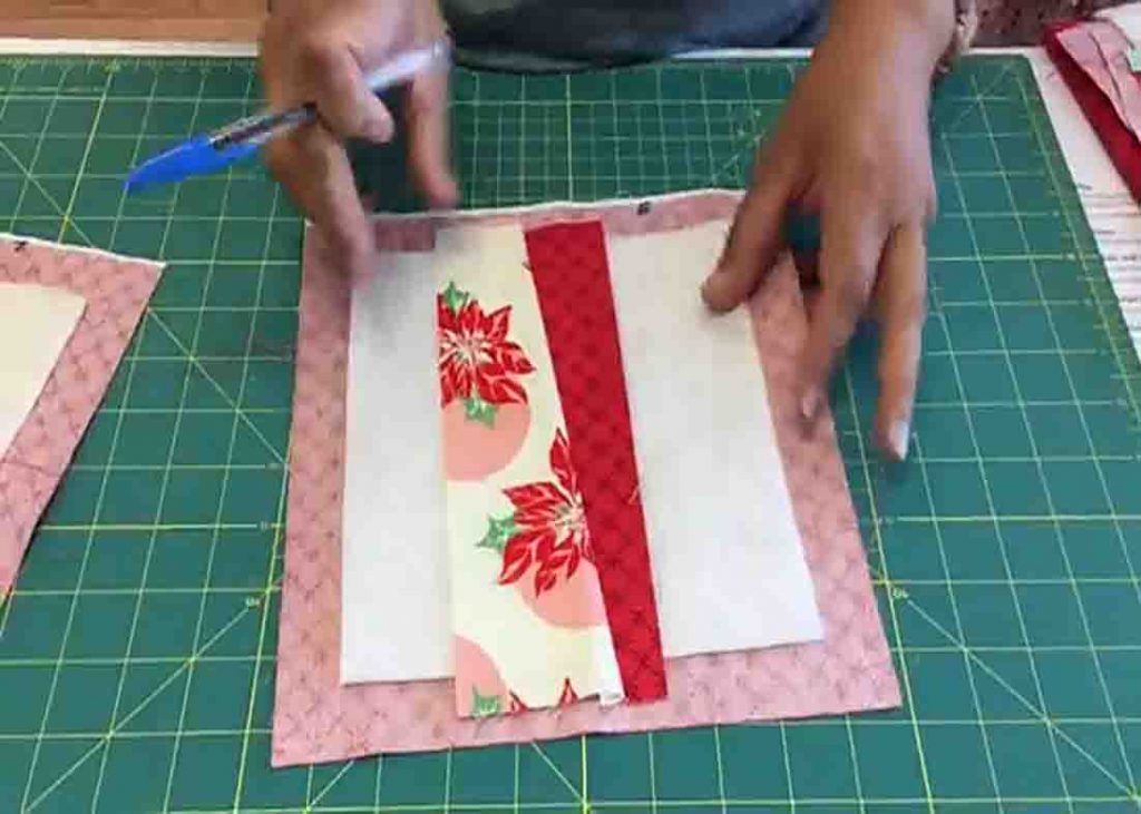 Adding the quilt pieces to the batting to form the block