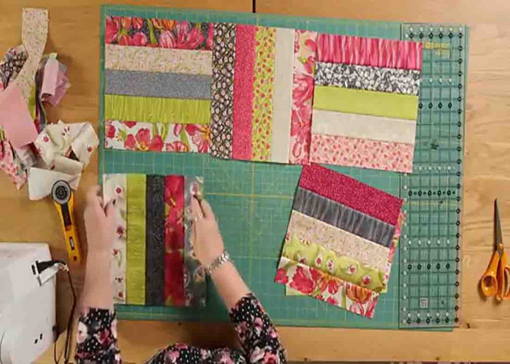 Laying out the no-match jelly roll quilt blocks