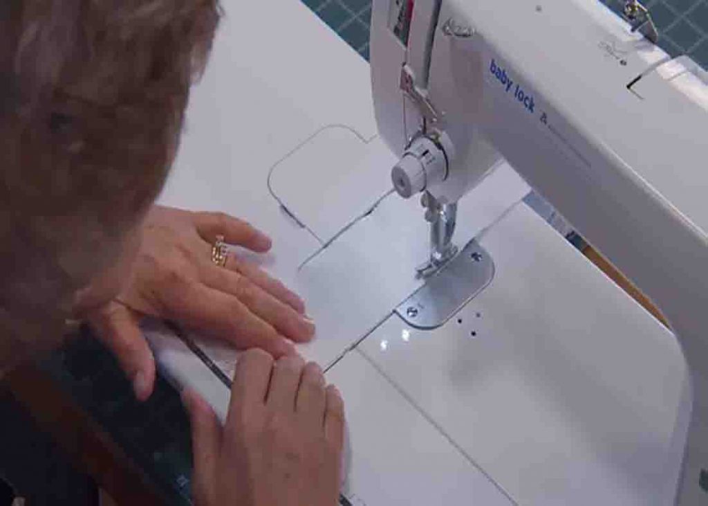 Sewing the strips to create the four-patch