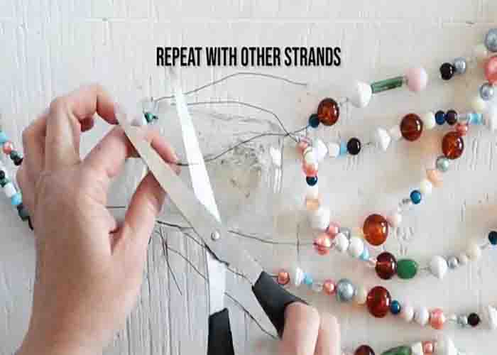 Attaching the bead strands to the mason jar