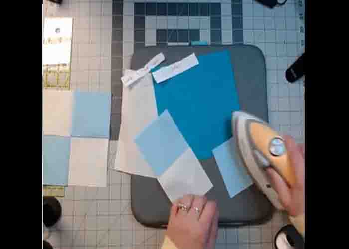 Making the four-patch for the sickle quilt block