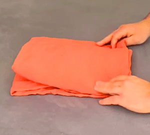 How to Fold a Bed Sheet in 12 Seconds - DIY Joy