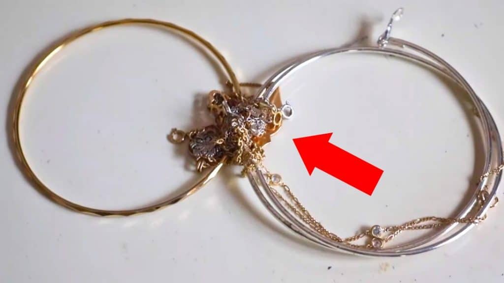 How to Untangle Knotted Necklaces