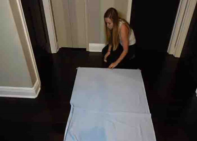 How to Baste a Quilt Using Spray Adhesive - DIY Joy