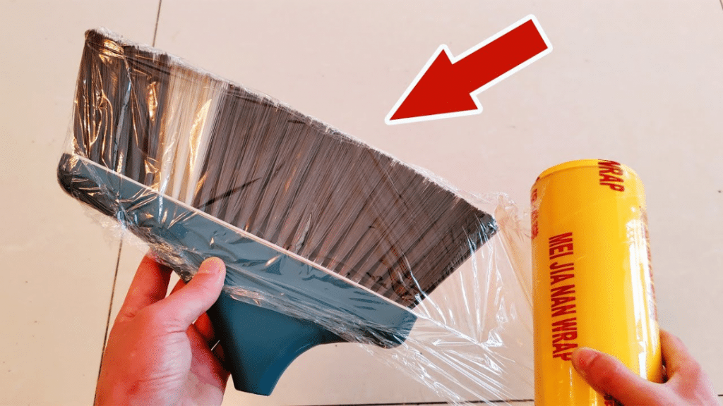 Easy Broom Plastic Wrap Cleaning Hack