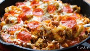 Easy Cheesy Ground Beef Tortellini Pizza Bake