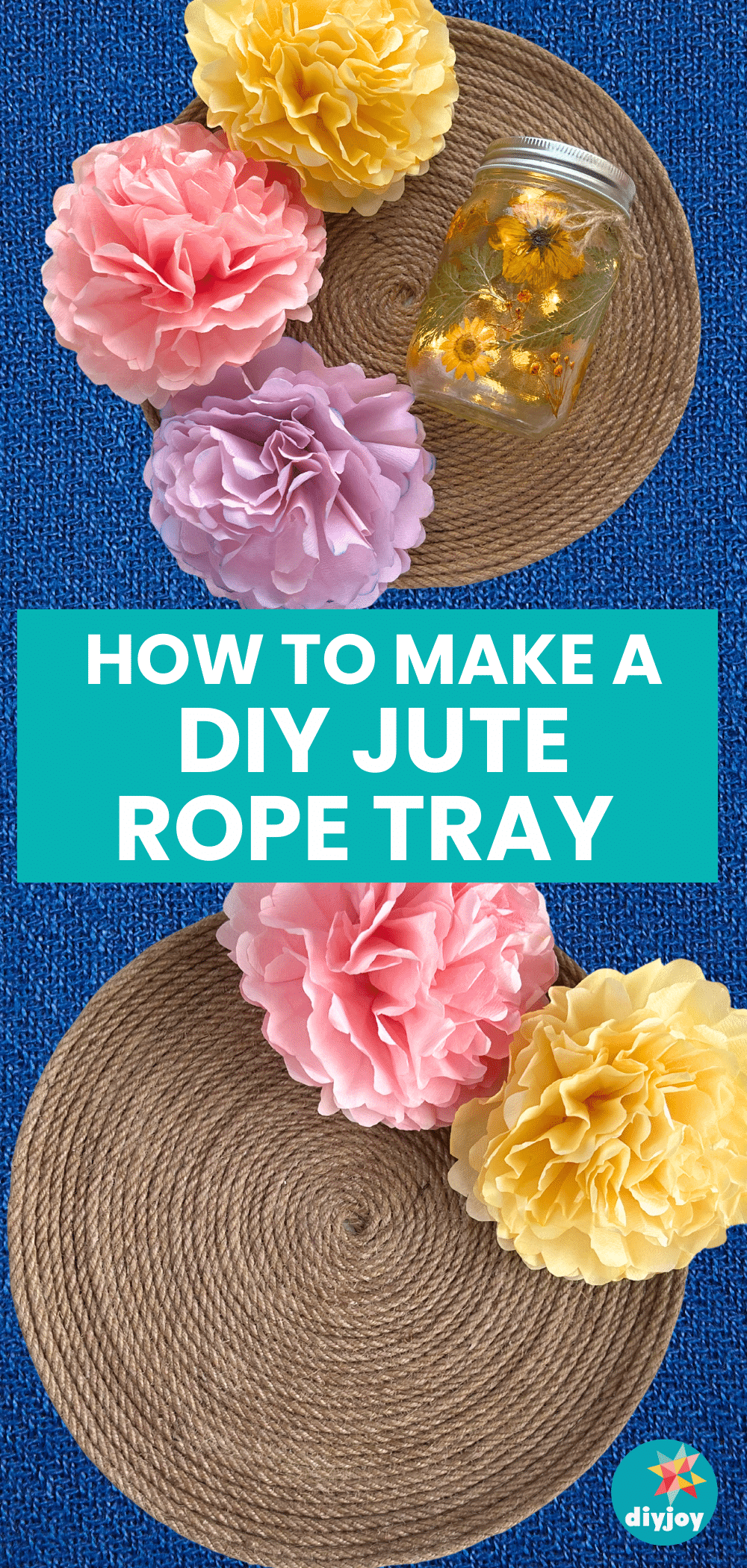 Round DIY jute rope tray coiled in a tight spiral, topped with pink, purple and yellow paper flowers and a mason jar light