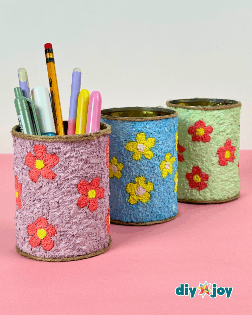 Cute DIY Tin Can Organizer with Paper Mache Floral Decoration