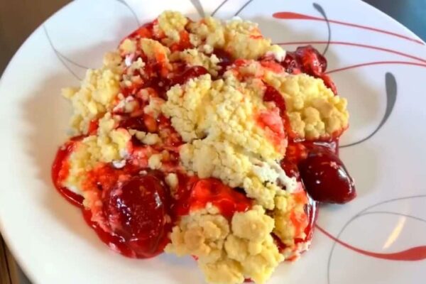 5-Ingredient Strawberry Cheesecake Dump Cake, homemade and freshly served