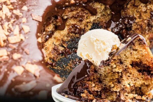 6-Ingredient Slow Cooker Butterfinger Cake, homemade and freshly served