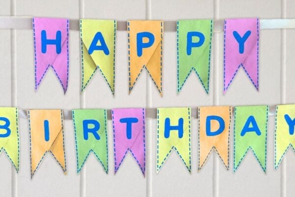 DIY Birthday Banner With Toilet Paper Rolls — easy step-by-step DIY tutorial.