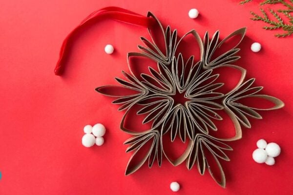 Make Beautiful DIY Snowflake Ornaments With Toilet Paper Rolls — easy step-by-step DIY tutorial.