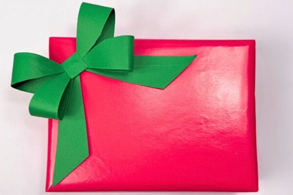 How to Make a Paper Bow — easy step-by-step DIY tutorial.