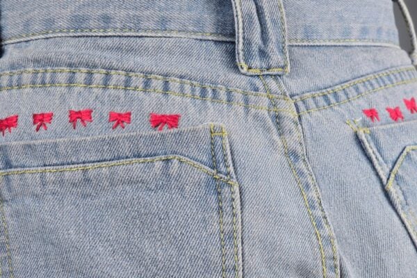 How to Make a Cute Bow Embroidery on Jeans — easy step-by-step DIY tutorial.