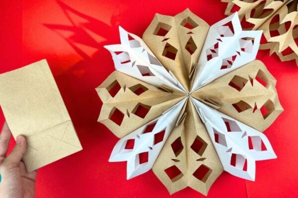 How to Make a Snowflake With Paper Bags — easy step-by-step DIY tutorial.