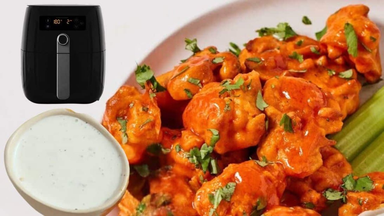 Air Fryer Cauliflower Wings Recipe Air fryer cauliflower wings party appetizer coated in buffalo sauce and stacked with ranch dressing alongside