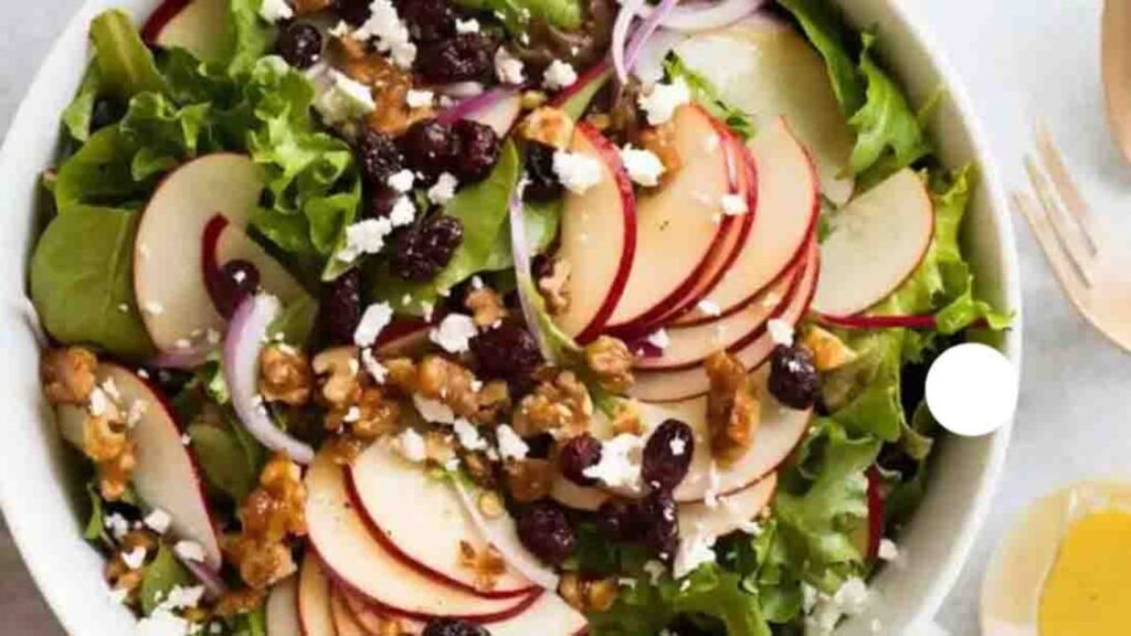 Apple Salad with Walnuts and Cranberries, homemade and freshly served
