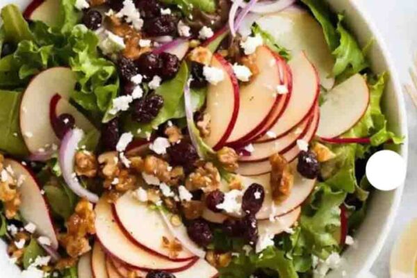 Apple Salad with Walnuts and Cranberries, homemade and freshly served