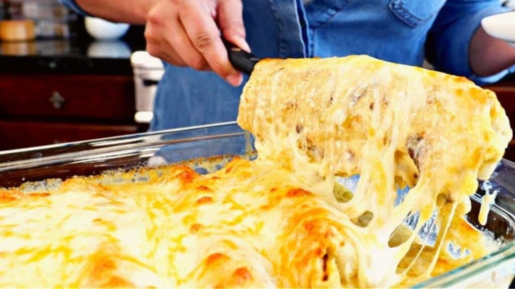 Baked Burritos Smothered w/ Creamy White Sauce, homemade and freshly served