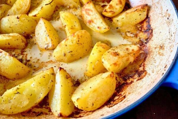 Baked Greek Lemon Potatoes, homemade and freshly served